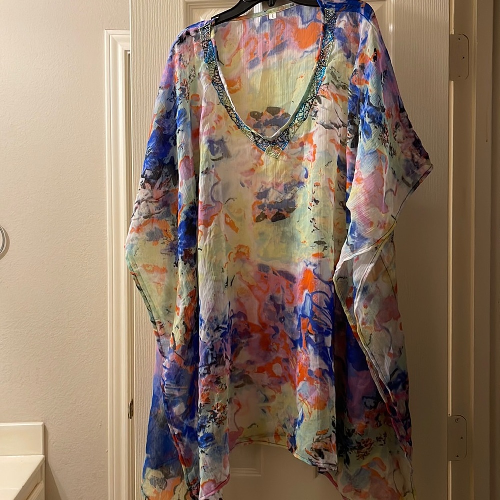 Smooth sailing: pastels to relax on land or water. Cami w/jeans/swimsuit, works.